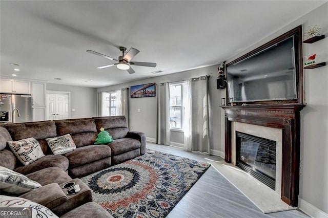 living room with ceiling fan