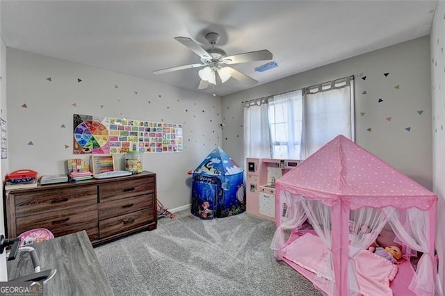 bedroom featuring ceiling fan and light colored carpet