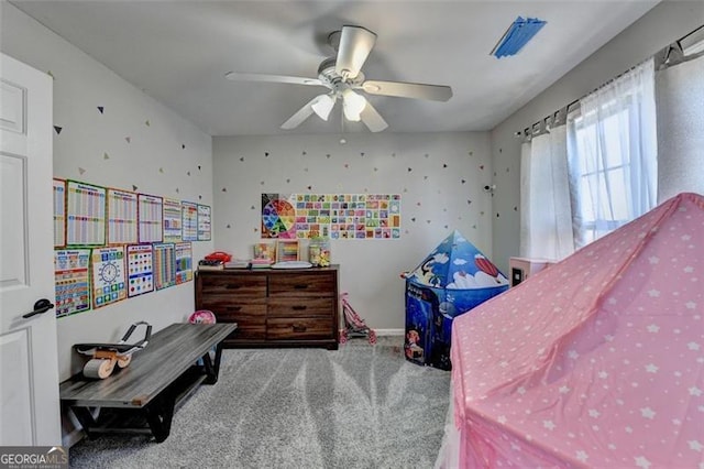 carpeted bedroom with ceiling fan