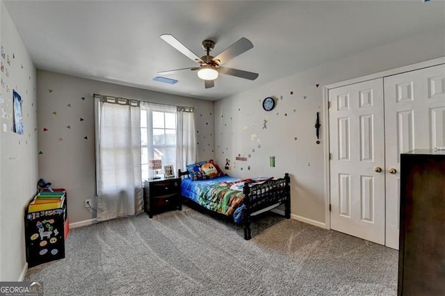 bedroom with ceiling fan and carpet floors