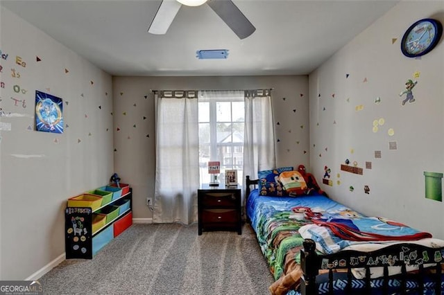 carpeted bedroom featuring ceiling fan