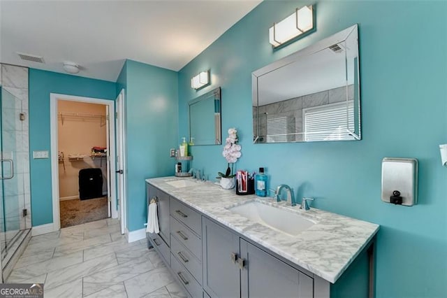 bathroom featuring vanity and walk in shower