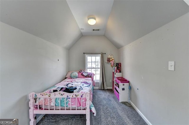 bedroom featuring carpet flooring and vaulted ceiling