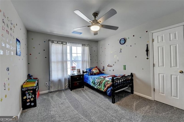 carpeted bedroom featuring ceiling fan