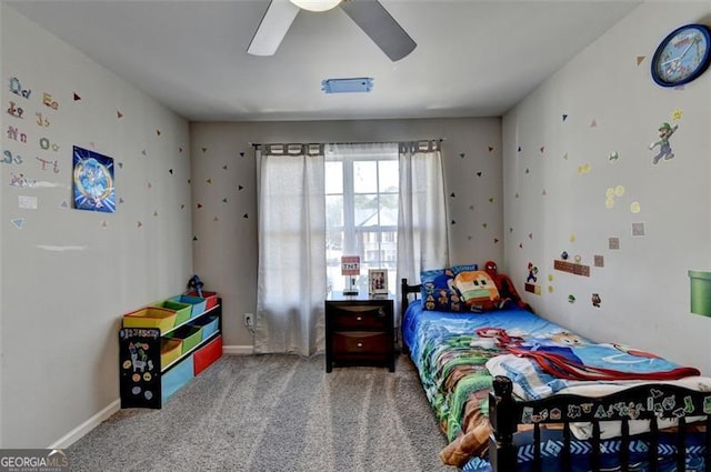 carpeted bedroom featuring ceiling fan