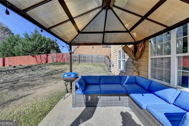 view of patio with a gazebo and an outdoor hangout area