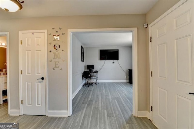 hall featuring light hardwood / wood-style flooring