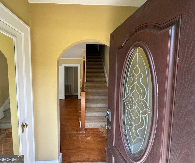 entrance foyer with hardwood / wood-style floors