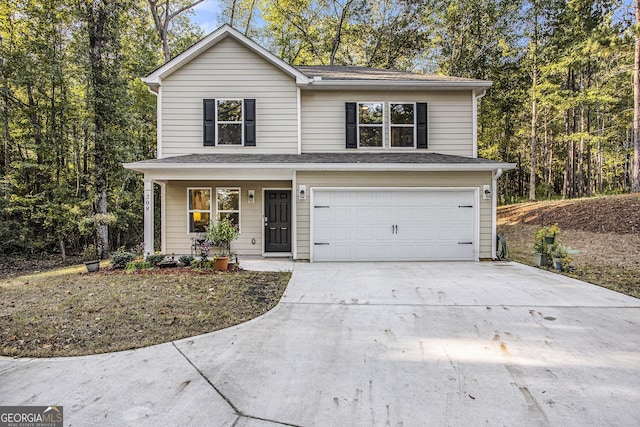 view of property with a garage