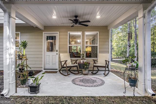 view of patio featuring ceiling fan