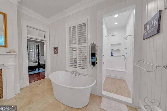 bathroom featuring crown molding and shower with separate bathtub