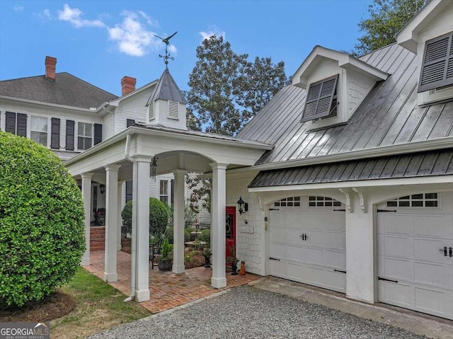 view of front of property featuring a garage