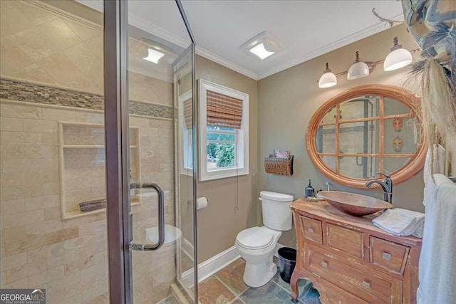full bathroom with vanity, baseboards, a stall shower, ornamental molding, and toilet