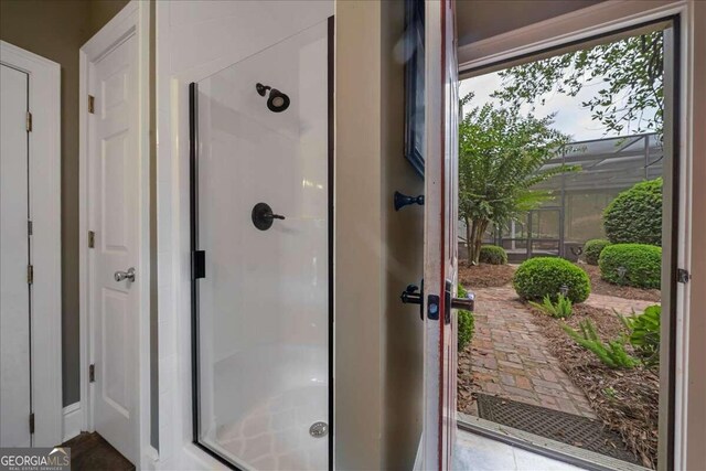 full bathroom with a shower stall