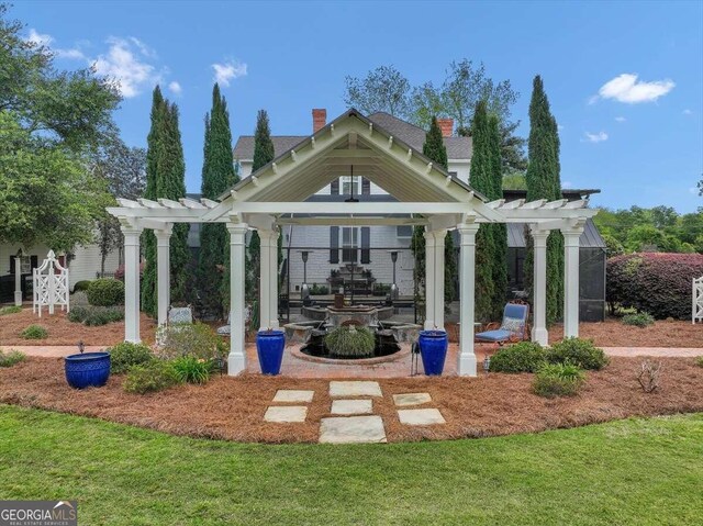 exterior space with a gazebo and a pergola