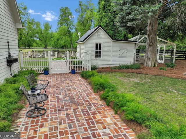 exterior space featuring a gate and fence