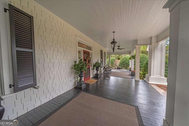 view of patio featuring ceiling fan