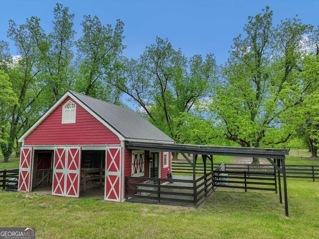 view of outbuilding with an exterior structure and an outdoor structure