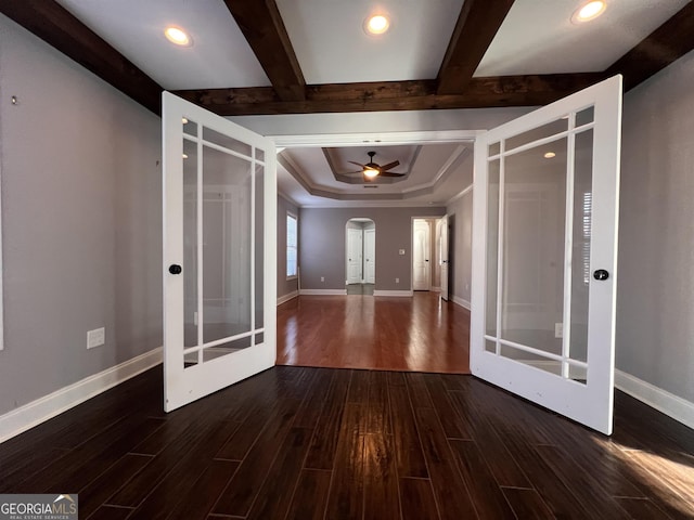 entryway featuring ceiling fan, french doors, and dark hardwood / wood-style floors