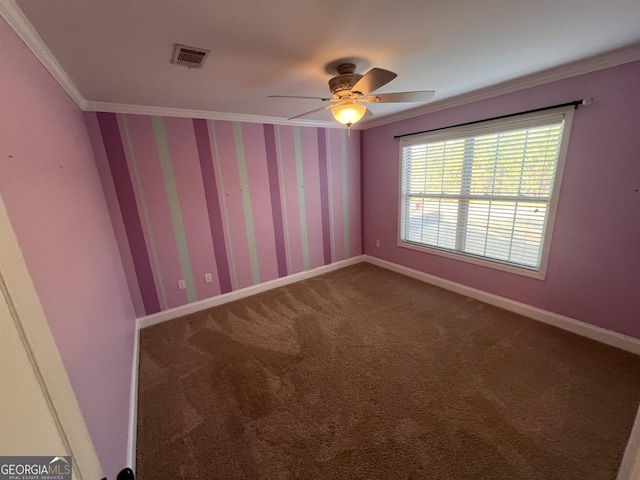 unfurnished room featuring ceiling fan, carpet floors, and ornamental molding