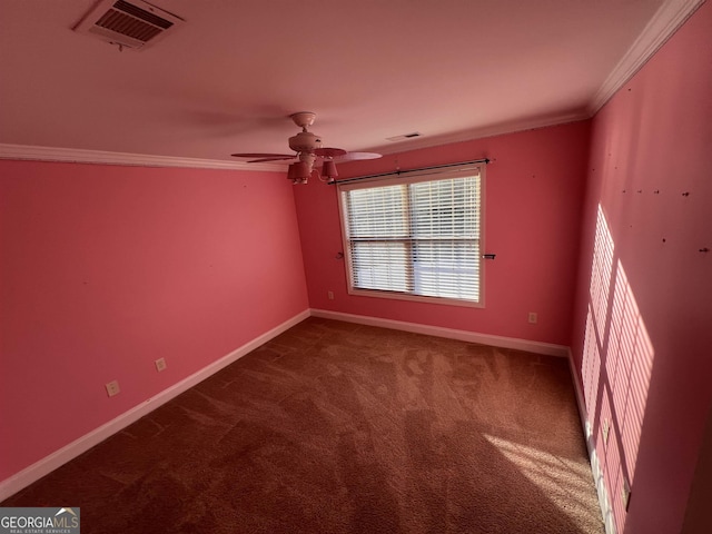 unfurnished room with carpet floors, ceiling fan, and crown molding