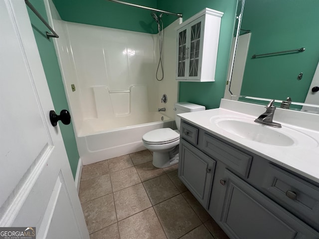 full bathroom featuring tile patterned floors, vanity, tub / shower combination, and toilet