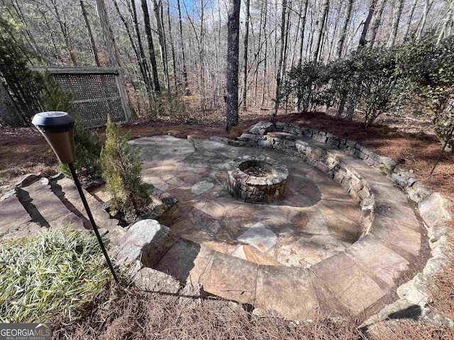 view of patio featuring a fire pit