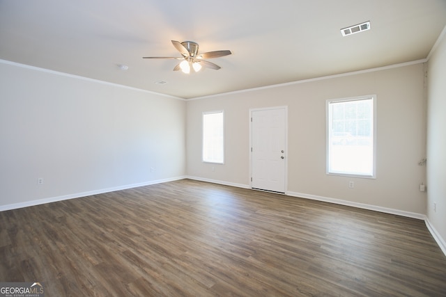 unfurnished room with dark hardwood / wood-style flooring, ceiling fan, and ornamental molding