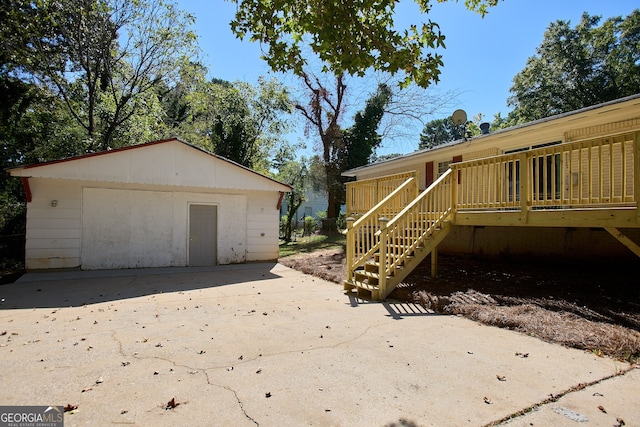 view of property exterior with a deck