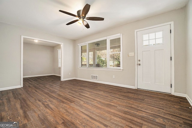 foyer featuring ceiling fan and dark hardwood / wood-style flooring