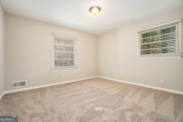 view of carpeted spare room