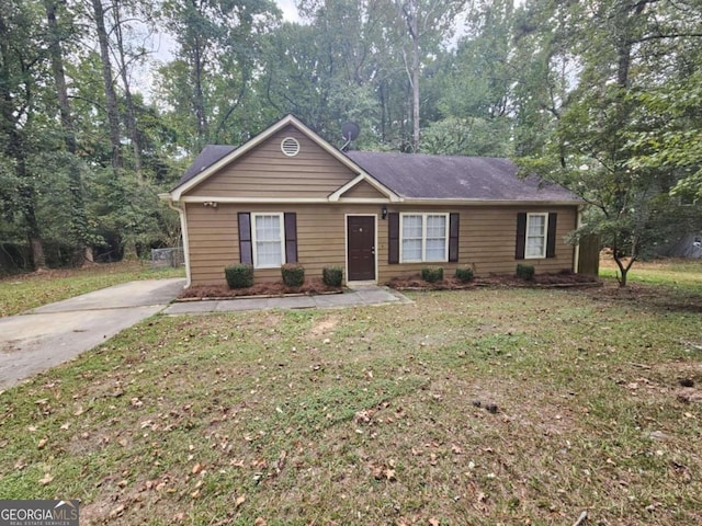 ranch-style house with a front lawn