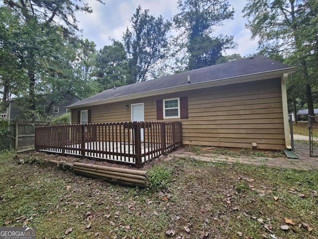 rear view of house with a deck