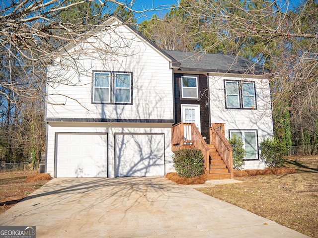 split foyer home featuring a garage