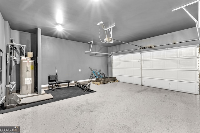 garage featuring electric water heater and a garage door opener