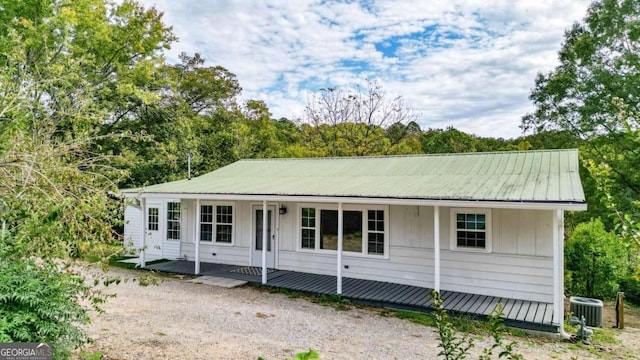 view of front facade featuring central AC unit and covered porch