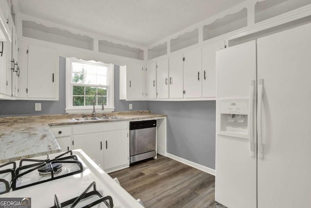 kitchen featuring dishwasher, sink, white fridge with ice dispenser, dark hardwood / wood-style flooring, and white cabinetry