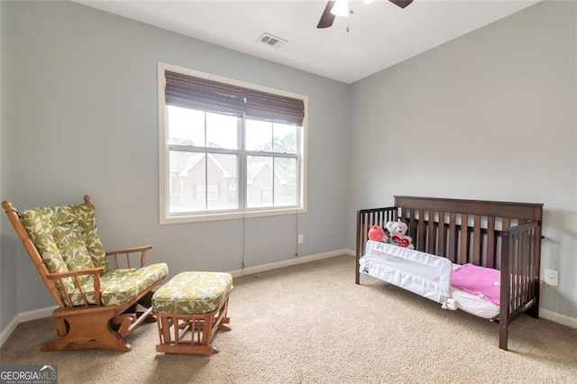 carpeted bedroom with ceiling fan