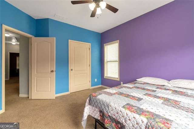 bedroom with carpet and ceiling fan