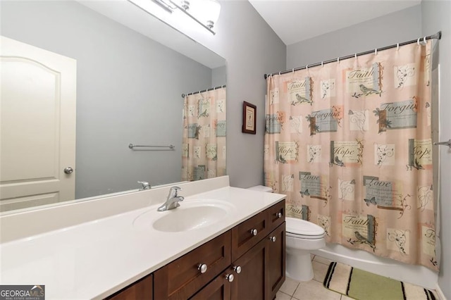 full bathroom featuring tile patterned floors, vanity, toilet, and shower / bathtub combination with curtain