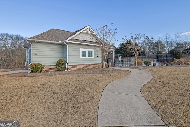 exterior space with a front yard