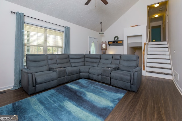 living room featuring a textured ceiling, ceiling fan, high vaulted ceiling, and dark hardwood / wood-style floors