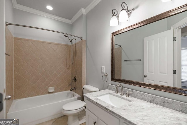 full bathroom featuring vanity, toilet, tiled shower / bath, and crown molding