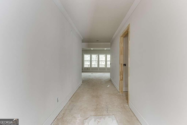 hallway featuring ornamental molding