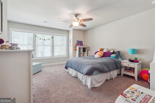 carpeted bedroom with ceiling fan