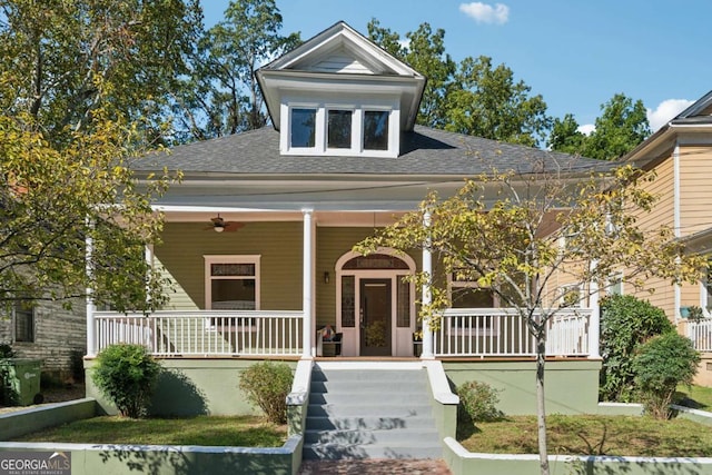 view of front facade with ceiling fan and a porch