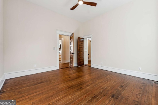 unfurnished bedroom with ceiling fan and dark hardwood / wood-style floors