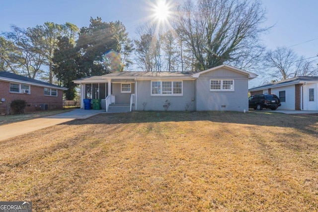 ranch-style house with a front lawn