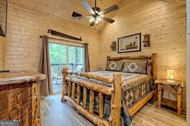 bedroom with lofted ceiling, wood ceiling, access to outside, light wood-type flooring, and ceiling fan