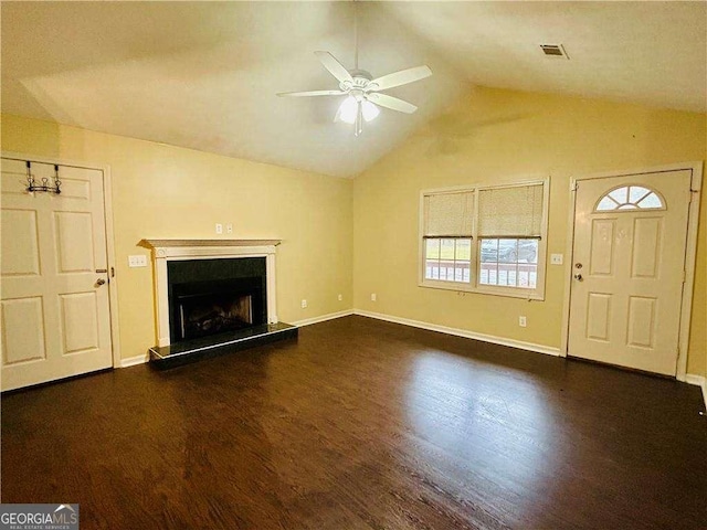 unfurnished living room with ceiling fan, dark hardwood / wood-style flooring, and lofted ceiling